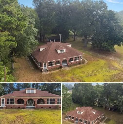 Incredible Real Estate Opportunity: 4-Bedroom Home with Acreage and Detached Garage in Augusta, Kansas